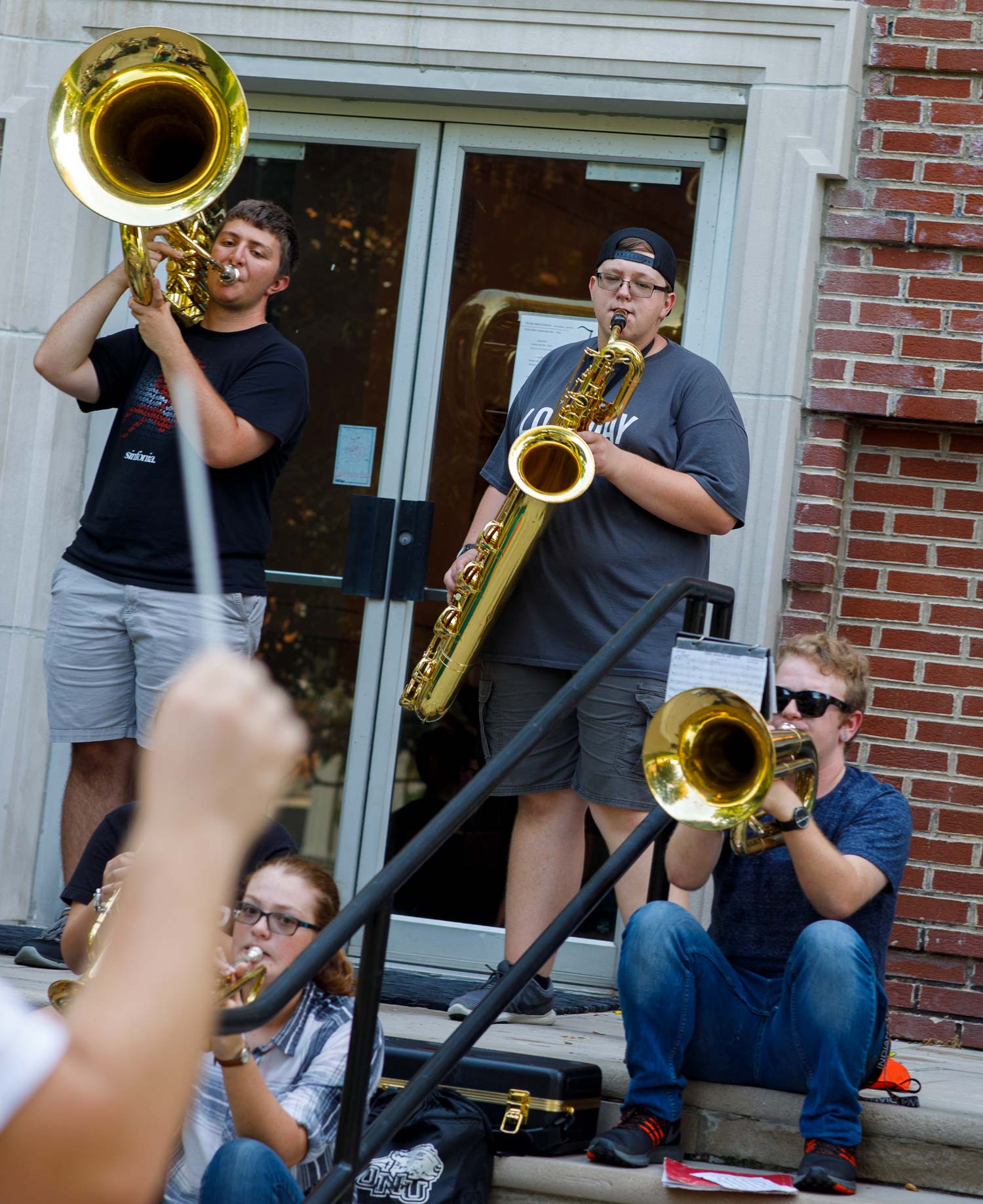 Music students practice outside Presser Hall on the campus of «Ӱҵ.